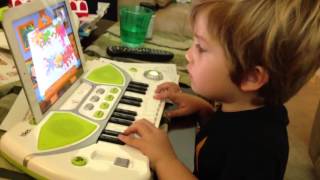 Toddler playing with iTikes Piano for iPad [upl. by Cheng]