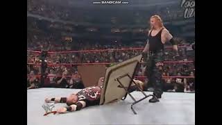 The Undertaker chokeslams Bubba Ray Dudley through table [upl. by Kreitman]