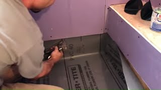 Easy Shower Pan Liner Tile Coach Episode 9 [upl. by Enitsirhk676]