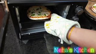 How to make Pizza in OTG oven Easy Pizza Recipe in OTG  Simple Method to make Pizza in Pigeon OTG [upl. by Notse635]