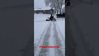 Grasshopper 725D snowblowing with a 412 blower [upl. by Aissela]