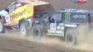 Robby Gordon bumps another driver at the Dakar rallye [upl. by Yks141]