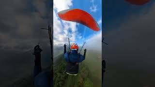 Emerging from the Clouds  Scenic Paragliding Flight Above Unterseen [upl. by Argyres91]