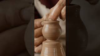 Man potter working on potters wheel making vase from clay Potter at work pottery [upl. by Gnilyam]