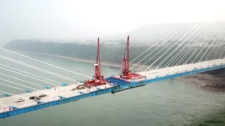 Main structures of Nanxi Yangtze River Bridge joined up in southwest China [upl. by Lunetta]