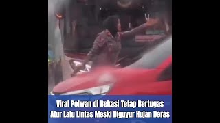 Viral Polwan di Bekasi Tetap Bertugas Atur Lalu Lintas Meski Diguyur Hujan Deras [upl. by Maureen]