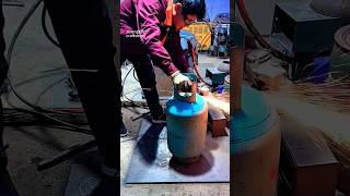 Cutting used gas canisters with a cutter to make a woodstove [upl. by Odinevneib]