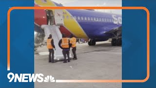 Cellphone battery catches fire on Southwest flight at DIA prompts evacuation [upl. by Alig]