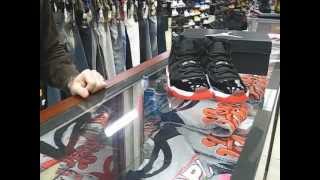 Nike Air Jordan 11 Retro Bred  Black Varsity Red White  at Street Gear Hempstead NY [upl. by Akcirred908]