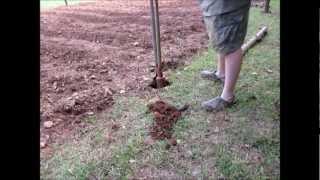 dig post holes put up posts and running the fence [upl. by Ayvid]