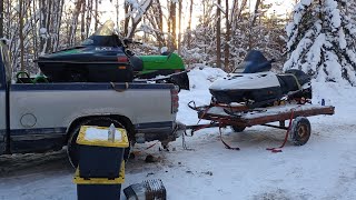 loading a snowmobile in a truck bed with a single place tilt trailer and no ramps [upl. by Zora]