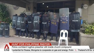 Philippine police confident fugitive preacher still inside church compound [upl. by Bourne875]