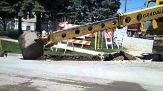 Landmark Contracters Gradall XL4100 digging for curb to be replaced [upl. by Edylc]