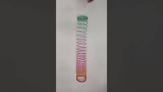 Slinky Falling in slow motion slowmotion viralshorts satisfying trending trendingshorts [upl. by Paver]