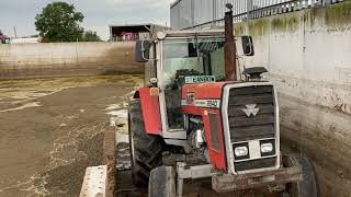 Massey Ferguson 2640 stirring slurry lagoon [upl. by Zavala]