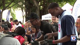 Miami Heats Bam Adebayo Udonis Haslem hold Thanksgiving meal giveaway [upl. by Drusi]