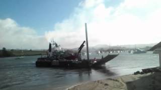 Risky Barge Launching at Sandspit Auckland New Zealand [upl. by Nylinej84]