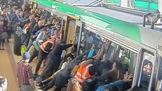 Man freed from train gap in Australia as passengers get out and push [upl. by Burnsed]