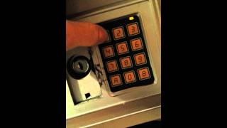 How to reset code on an electronic safe [upl. by Odraner]