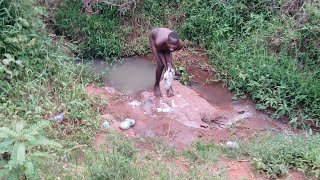 African village boy bathing in a river😱 Raw [upl. by Attehcnoc]