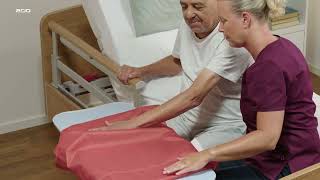 Rehabilitation activities using slide sheets  Patient Handling​  Arjo Global [upl. by Octavus]