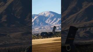 A Boeing C17 Globemaster III conducts low altitude maneuvers somewhere over the California desert [upl. by Acinnad]