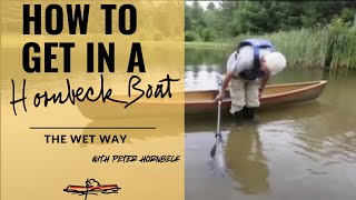 Hornbeck Boats How to get into a canoe [upl. by Afihtan]