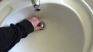 Fixing a stuck PopUp Basin WastePlug [upl. by Bollinger573]