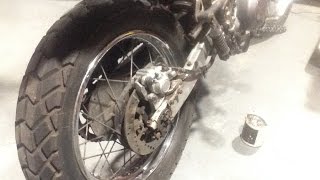 XT600e Rear Brake Caliper Rebuild  pistons and pads [upl. by Doelling]