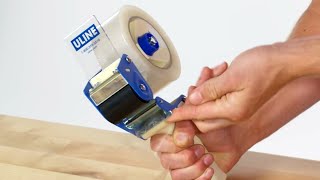 How to Load a Packing Tape Gun Dispenser [upl. by Ernie323]