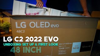 LG C2 OLED EVO TV  Unboxing Set Up and First Look 2022 [upl. by Airdnaxela270]