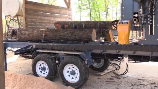 Baker Products 3665D Portable Band Sawmill In action [upl. by Retxab]