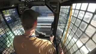 Bobcat Skid Steer Unloading Steel [upl. by Eenwat]