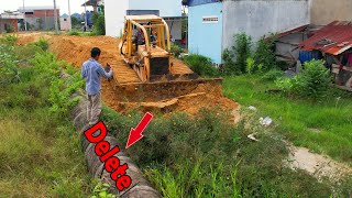 Getting Started New project​dozer Kumatsu Push the soil to clear the drain 25T Truck Loading Stones [upl. by Euqinomahs249]