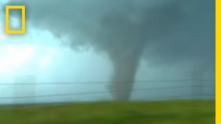 Tornadoes Lightning in Rare Video  National Geographic [upl. by Otrevlig]