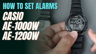 How To Set Alarms and Signal on Casio AE1000W and AE1200W World Time Illuminator  AE1000 AE1200 [upl. by Oenire]