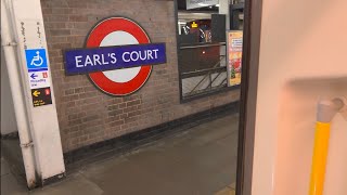 Earls Court Station at midnight and wayout of High Street Kensington Station [upl. by Nirtiac]