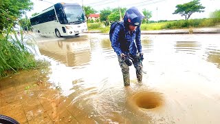 Draining a Heavily Flooded Street Unclogging Drains Stops Massive Floods [upl. by Burrill597]