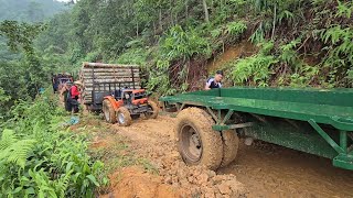 Tractors carrying timber during the rainy season must be pulled up by another vehicle [upl. by Ahtnicaj516]