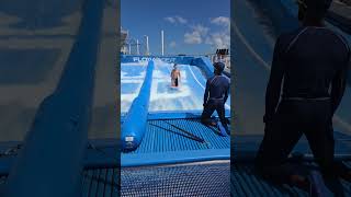 Wave Surfin 🤙 flowrider cruise waves royalcaribbean wipeout surf [upl. by Ihab205]