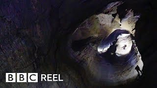 The daring journey inside the worlds deepest cave  BBC REEL [upl. by Berkin]