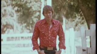 Glen Campbell  Rhinestone Cowboy Official Video [upl. by Elocn]