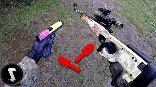 Guy Using 1250 REAL CSGO AWP Dragon Lore and Glock Fade in Airsoft War [upl. by Alled]