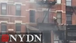 Off Duty FDNY Firefighter Scales Building on Fire [upl. by Attirehs]