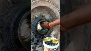 Filling grease inside the wheel hub shorts shortvideo [upl. by Illyes]