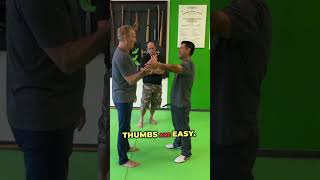 Simple SelfDefense Techniques Targeting the Thumbs selfdefense shorts [upl. by Miksen]