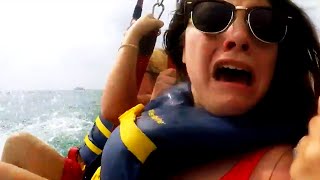 Vacationers Spot Sharks in Water While Parasailing [upl. by Weslee979]