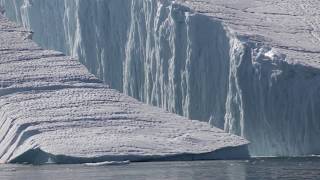 Large Iceberg Breaking near Ilulissat [upl. by Ylekalb]