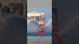 Why Tugboats Spray Water in Front of Large Ships shorts [upl. by Enasus]