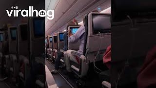 Airline Passenger Upset at Reclined Seat  ViralHog [upl. by Imoin]